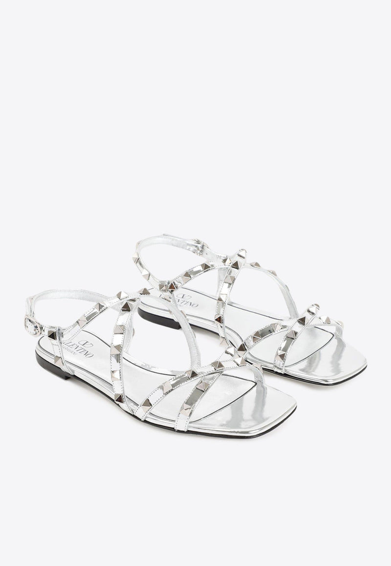 Rockstud Flat Sandals in Mirror-Effect Leather